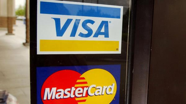 Visa、万事达卡同意与商户就刷卡费达成和解